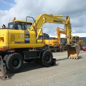 KOMATSU PW 160-7-колесный экскаватор