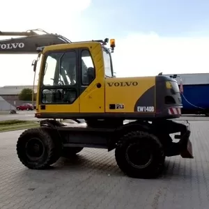 Volvo EW140 B-колесный экскаватор