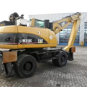 CATERPILLAR M318CMH-перегружатель