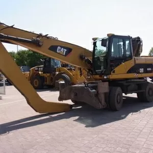 Caterpillar M318DMH-перегружатель