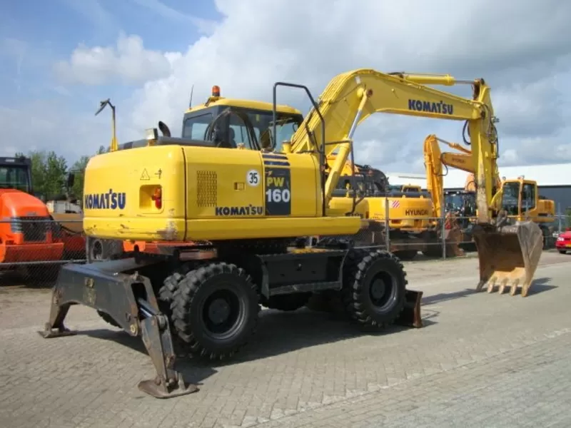 KOMATSU PW 160-7-колесный экскаватор