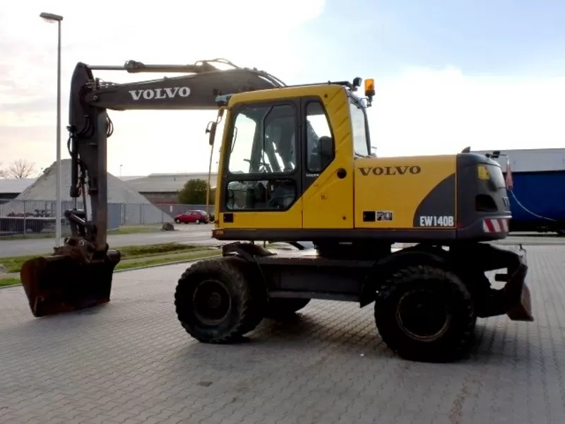 Volvo EW140 B-колесный экскаватор