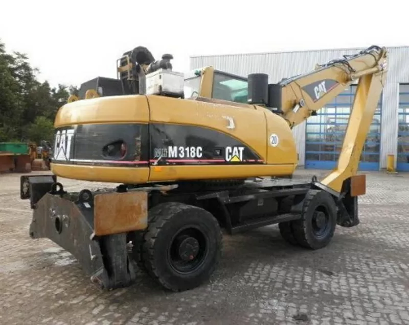 CATERPILLAR M318CMH-перегружатель