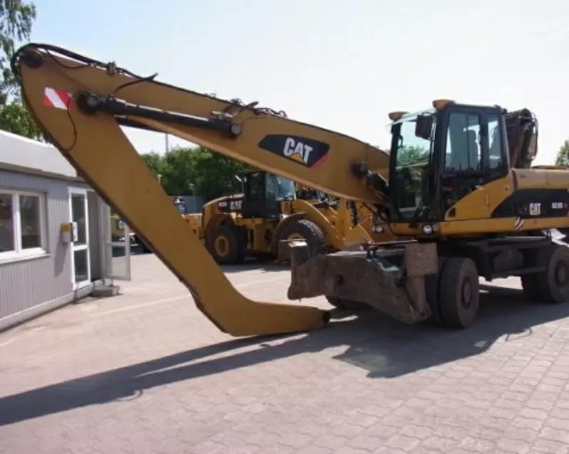 Caterpillar M318DMH-перегружатель